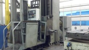 This is a Lucas 5 axes boring mill with a Fanuc 0i-MD.  The 5th axis is a contouring rotary table.