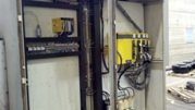 This is a Lucas 5 axes boring mill with a Fanuc 0i-MD.  The 5th axis is a contouring rotary table.