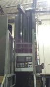 This is a Lucas 5 axes boring mill with a Fanuc 0i-MD.  The 5th axis is a contouring rotary table.